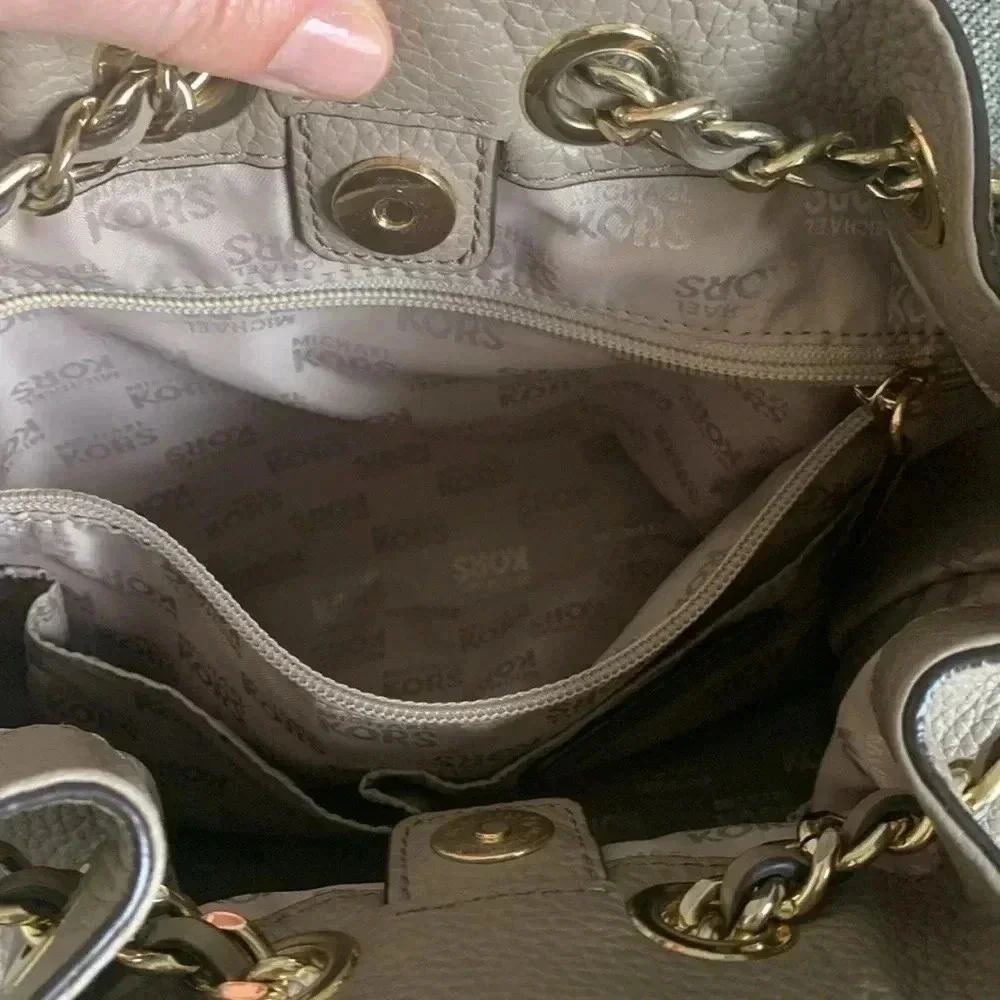 Michael Kors crossbody chain drawstring  bucket bag neutral putty color